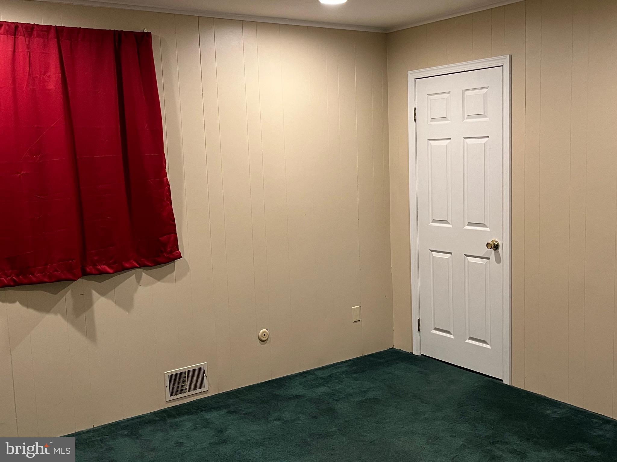 70 Winged Foot Drive Reading, PA 19607 - Photo 7 of 19 an empty room with a window and a door