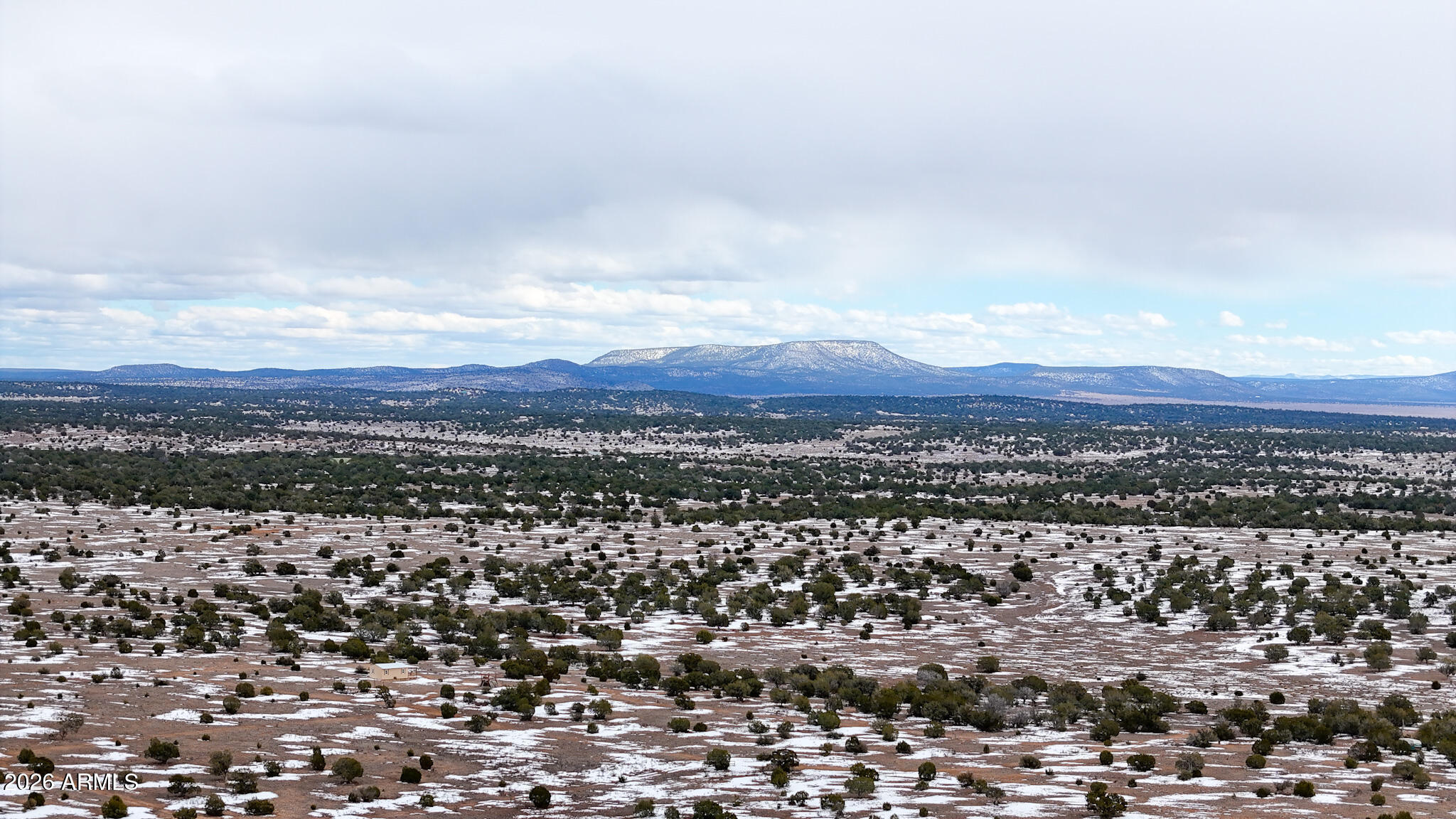 0 Dusty Rose Ranch Road, Unit 306A Seligman, AZ 86337 - Photo 2 of 14 an aerial view of residential building and street