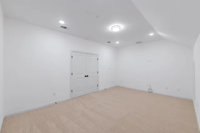 a view of a livingroom with a furniture and a ceiling fan