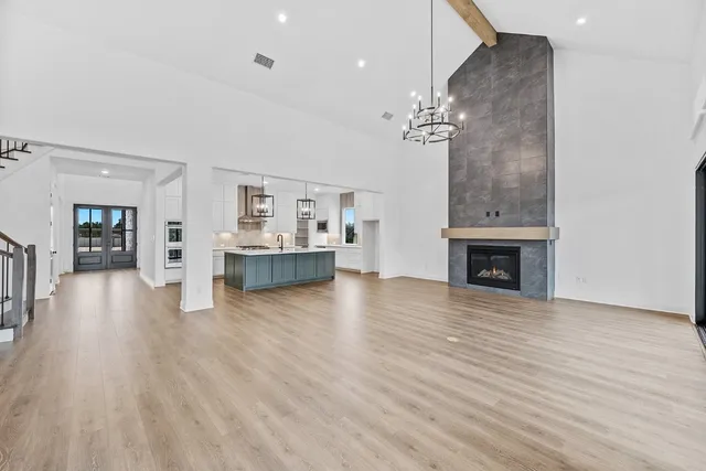 a view of a livingroom with furniture and wooden floor