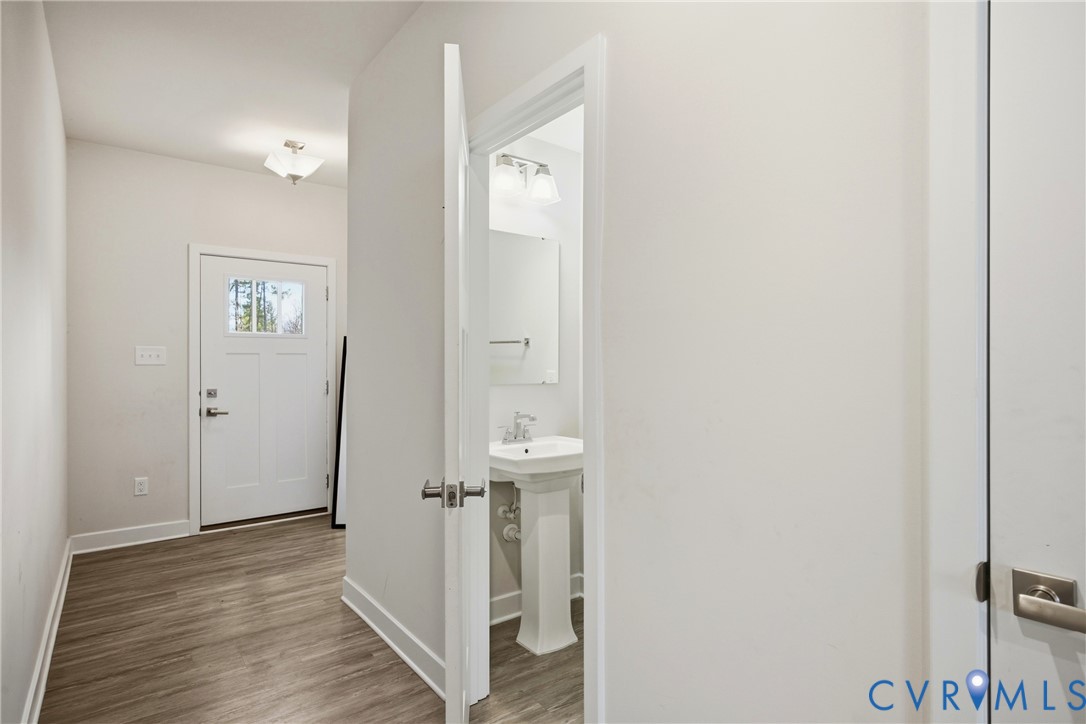 4124 Jefferson Rdg Drive Midlothian, VA 23112 - Photo 16 of 43 Entryway featuring light LVP flooring and baseboar