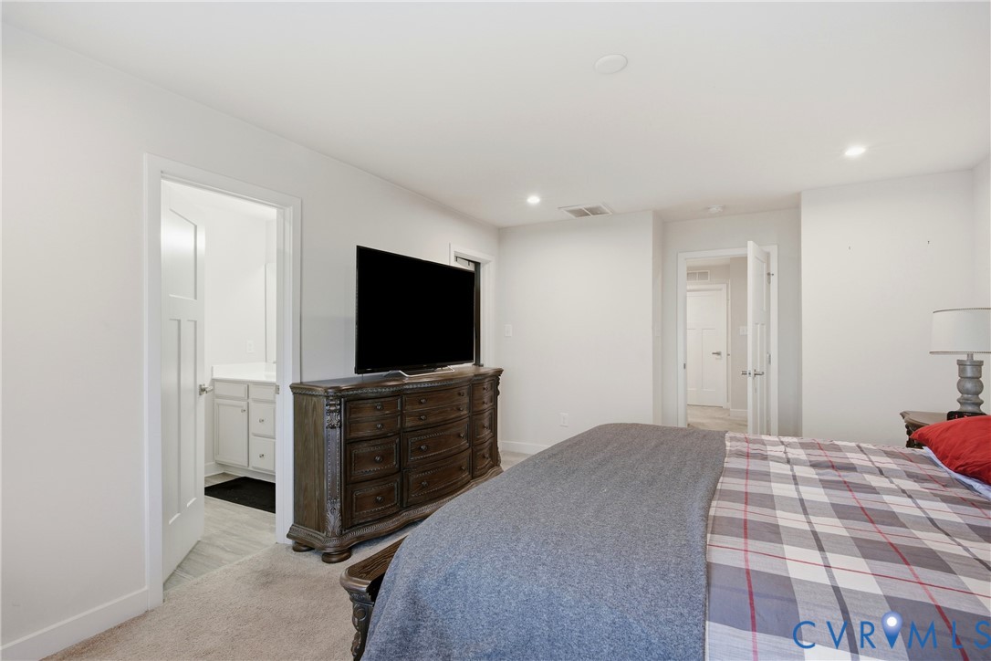 4124 Jefferson Rdg Drive Midlothian, VA 23112 - Photo 20 of 43 Bedroom featuring light carpet, connected bathroom