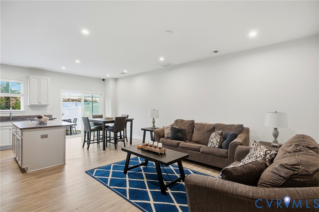 4124 Jefferson Rdg Drive Midlothian, VA 23112 - Photo 6 of 43 Living room with recessed lighting and light LVP f