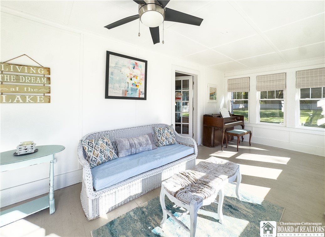 4988 West Lake Road Chautauqua, NY 14757 - Photo 4 of 44 The front porch is drenched in natural sunlight...