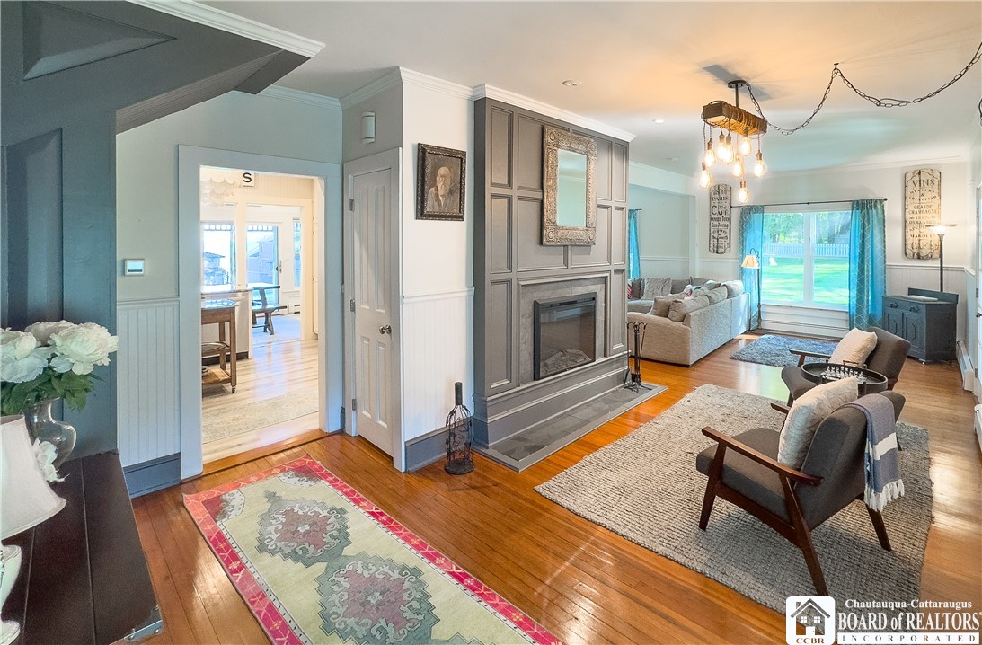 4988 West Lake Road Chautauqua, NY 14757 - Photo 7 of 44 where you will find a lovely Fireplace and sitting