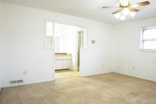 a view of an empty walk in closet