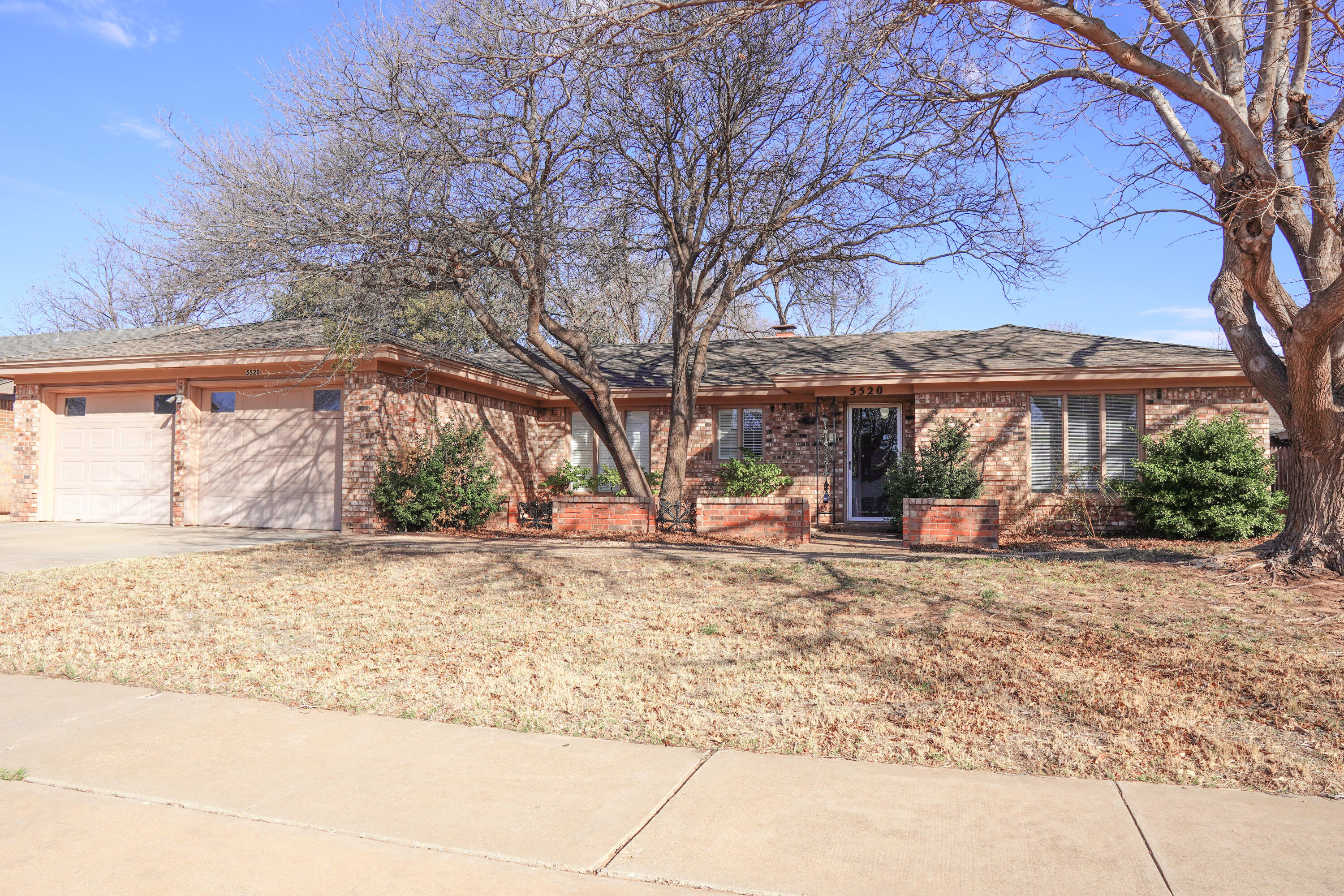5520 80th Street Lubbock, TX 79424 - Photo 2 of 29 a view of a out door of the house