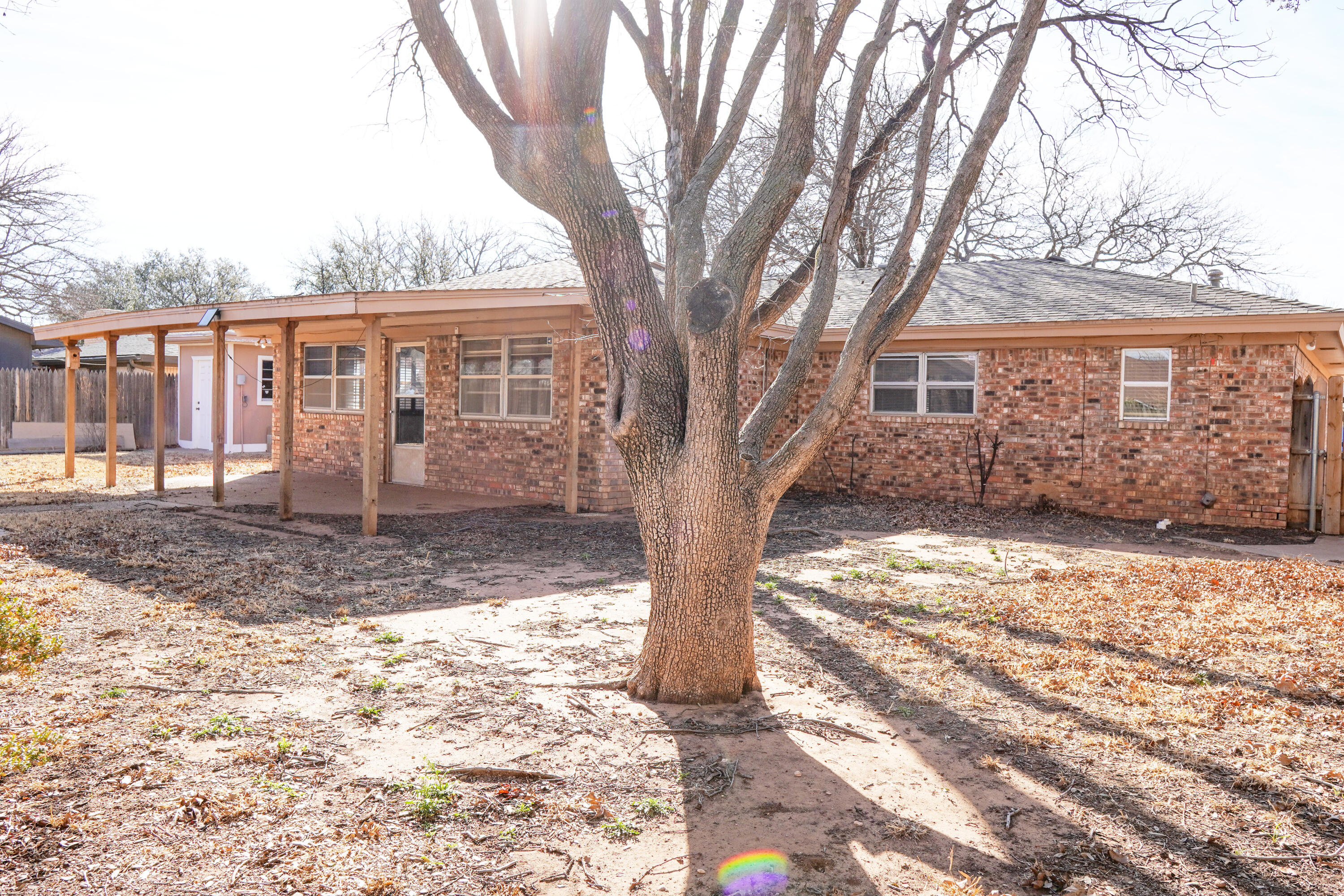 5520 80th Street Lubbock, TX 79424 - Photo 27 of 29 a view of a house with a tree