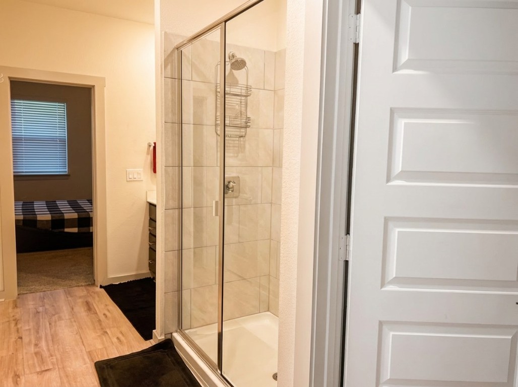 7515 Traylor Cove Austin, TX 78724 - Photo 6 of 13 a en suite bathroom with a shower