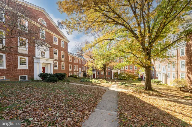 a view of a building with a yard