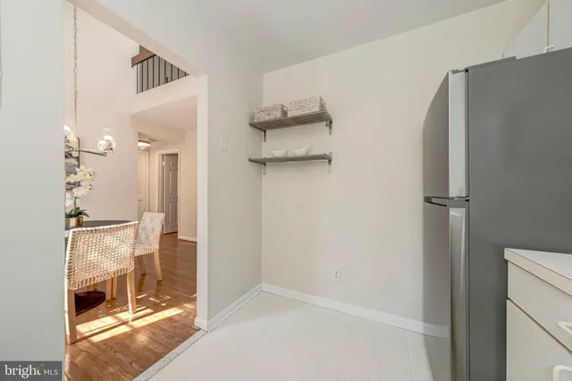 a bathroom with a shower and a mirror