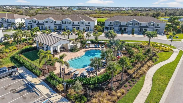 an aerial view of a building with outdoor space