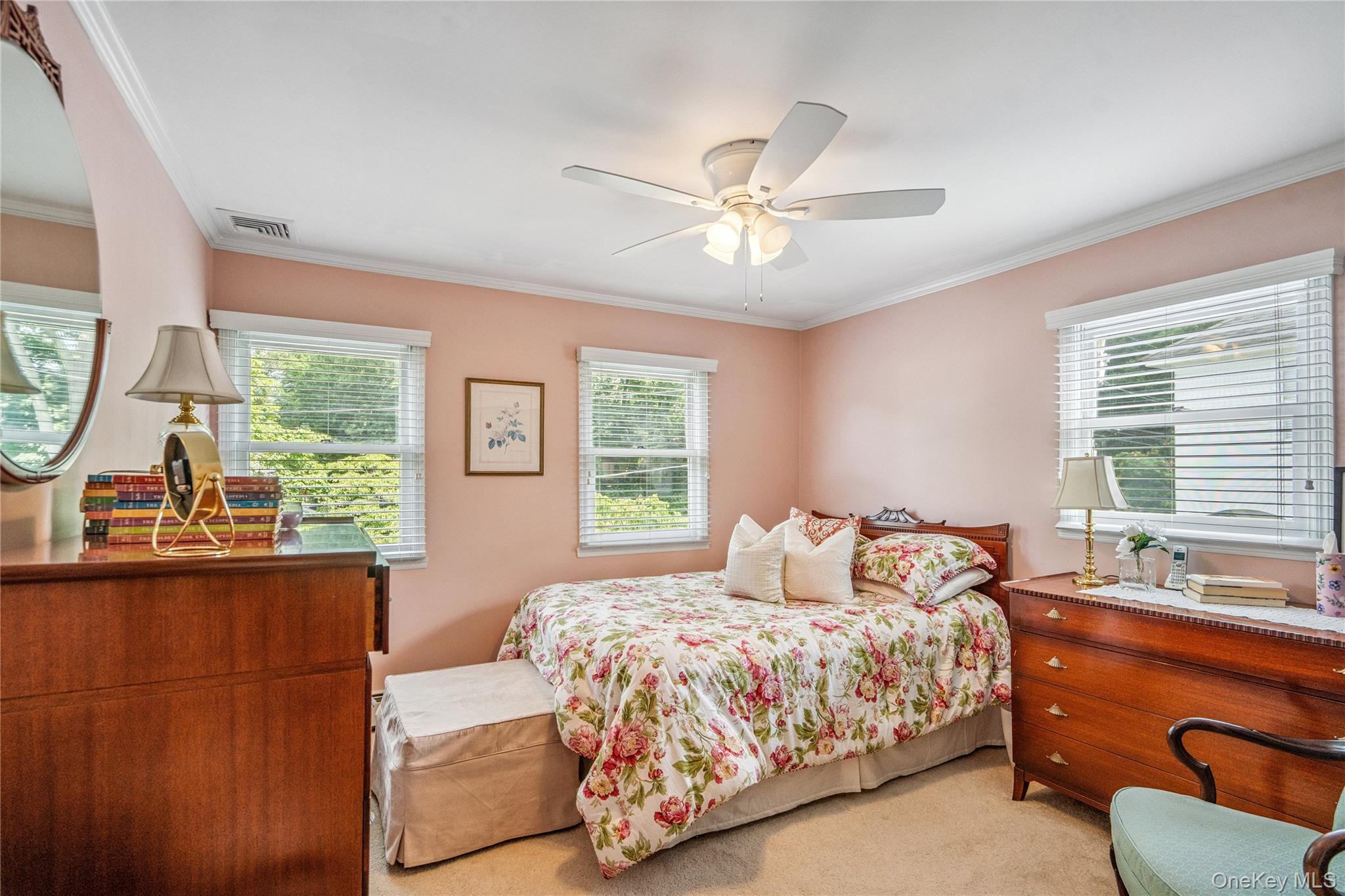 6 Cedar Avenue Locust Valley, NY 11560 - Photo 15 of 31 a bedroom with a large bed and a window