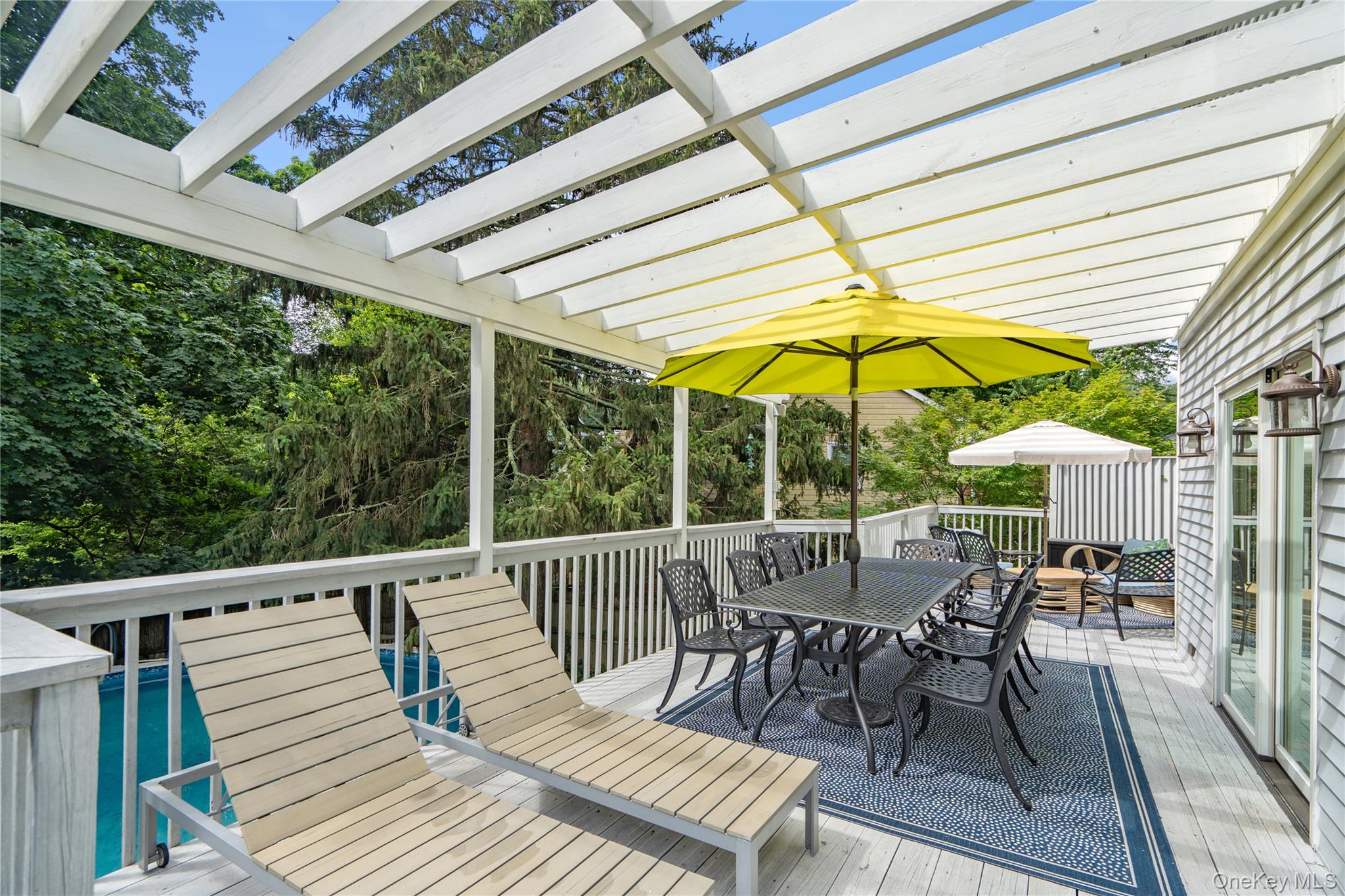 6 Cedar Avenue Locust Valley, NY 11560 - Photo 25 of 31 a view of a chairs and table in the balcony
