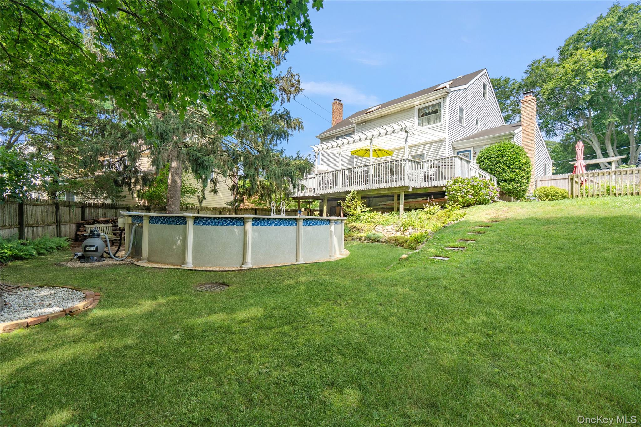 6 Cedar Avenue Locust Valley, NY 11560 - Photo 26 of 31 a view of a house with a yard