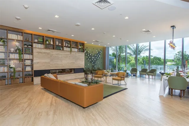 a room with pool table and outdoor seating