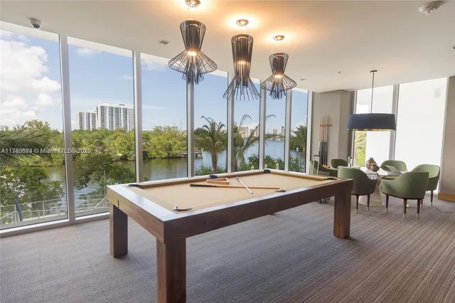 a view of a tall building with a yard