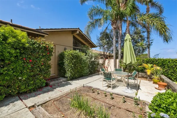 a view of a house with a street