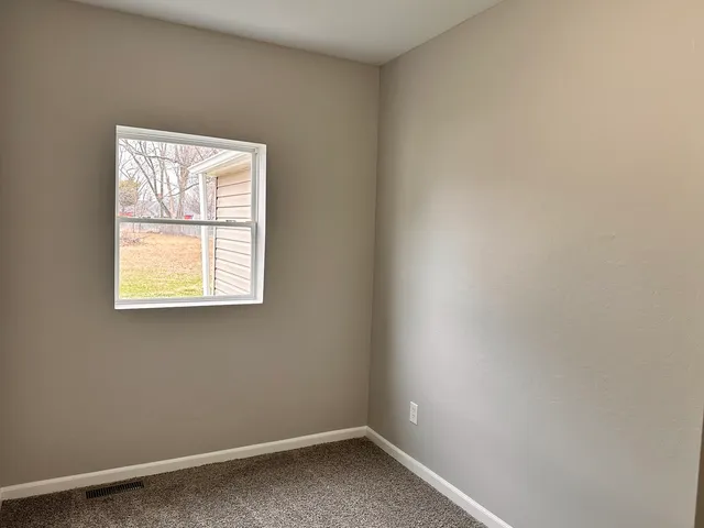 an empty room with a window