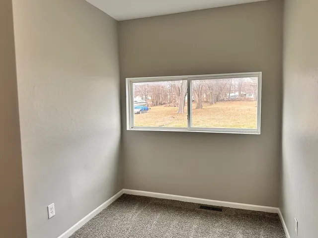 an empty room with a window