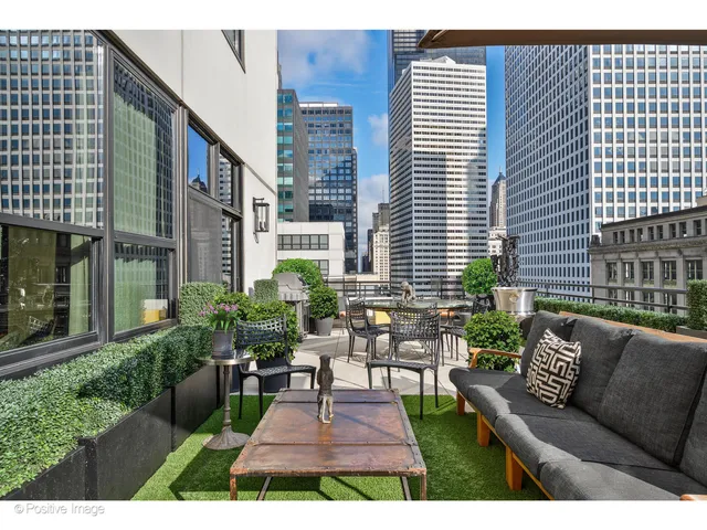 a kitchen with stainless steel appliances granite countertop a stove and cabinets