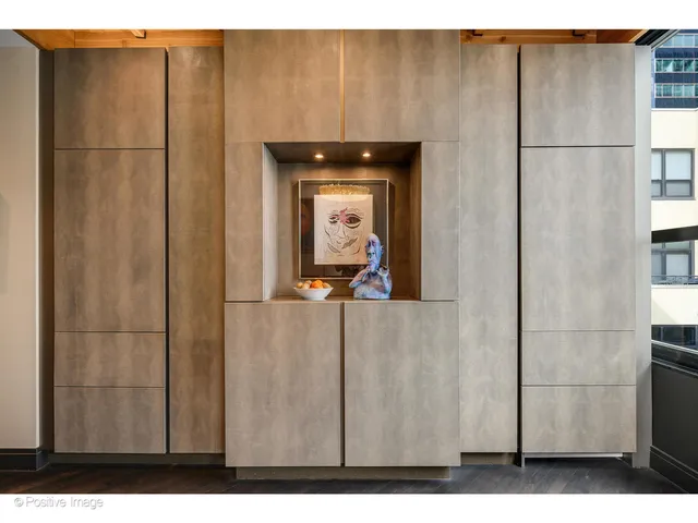 a workspace with furniture and window