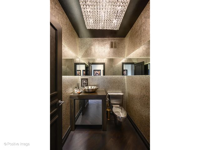 a bed room with a bed and a potted plant