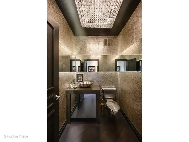 a bed room with a bed and a potted plant