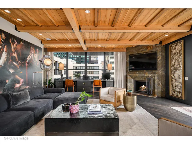 a living room with furniture a window and couch