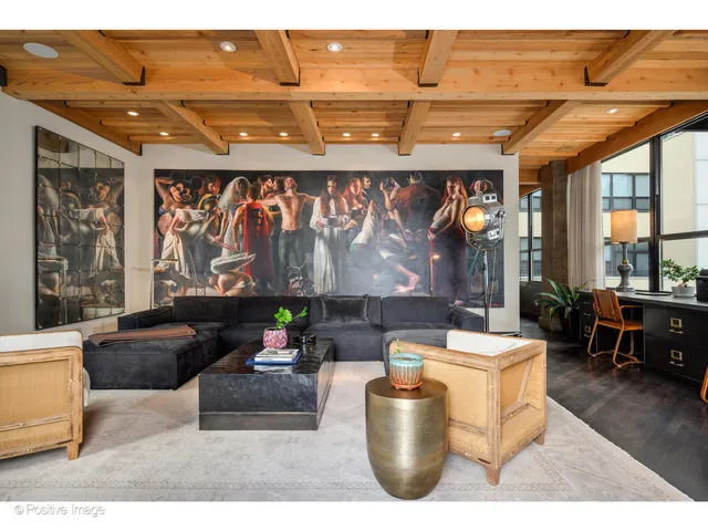 a living room with a couch and a table