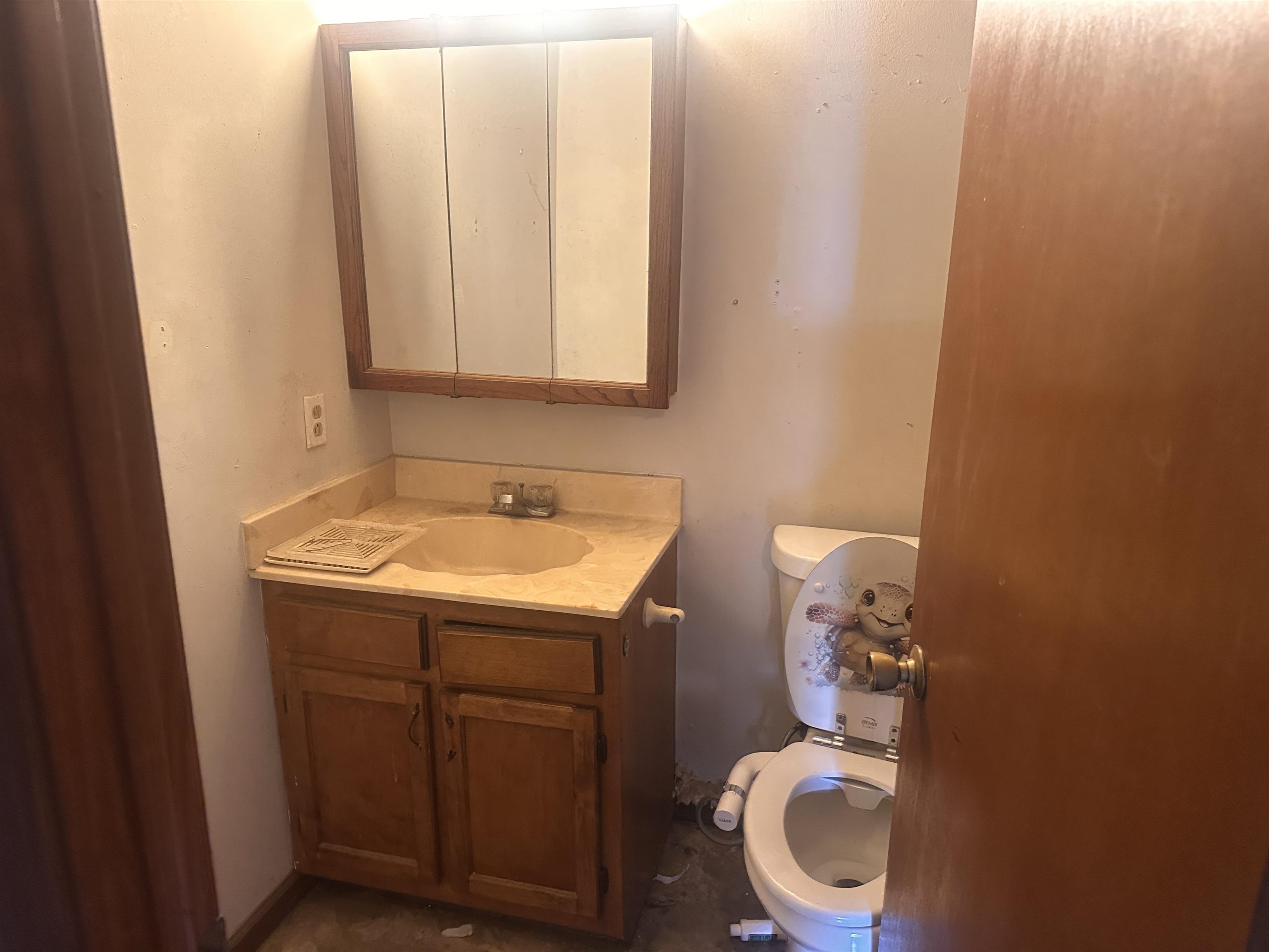605 Jr Drive Covington, TN 38019 - Photo 13 of 21 Bathroom featuring vanity and toilet