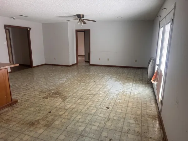 a view of an empty room and window