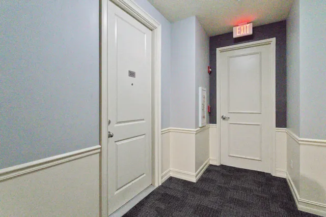 a view of hallway with stairs