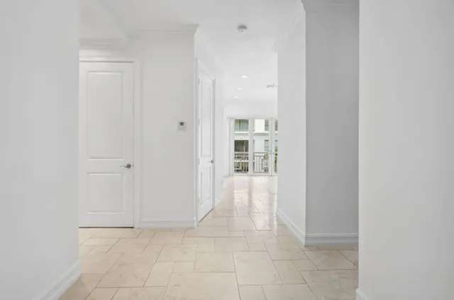 a kitchen with granite countertop a stove microwave and sink