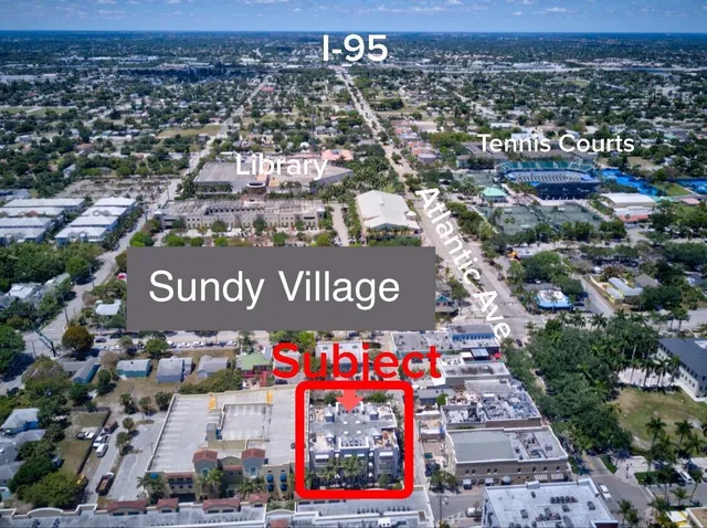 a front view of a building with garden