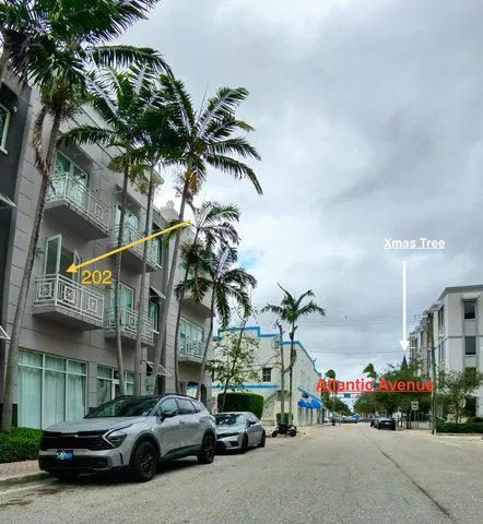 a view of multiple house with a street