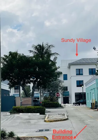 a view of a street sign of a house