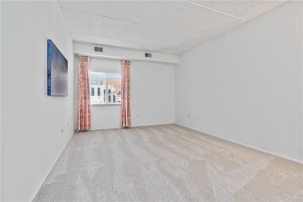 5600 Munhall Road, Unit 203 Pittsburgh, PA 15217 - Photo 15 of 31 a view of an empty room with a window