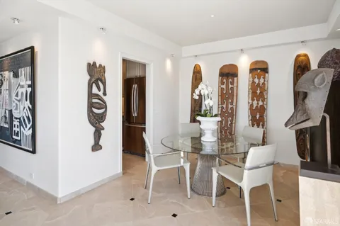 a view of a dining room with furniture