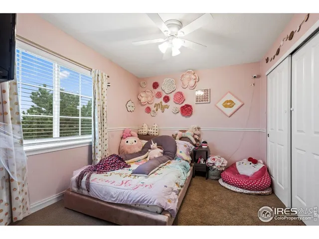 a bathroom with a sink mirror vanity and toilet