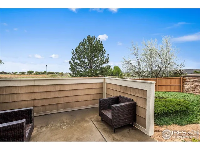 a view of a park with swings and slides