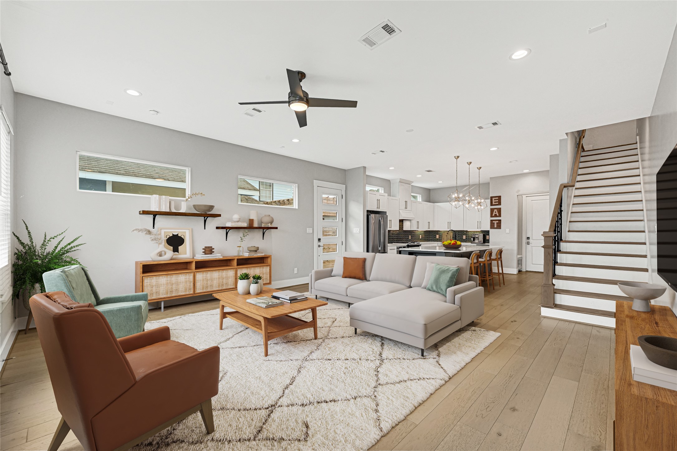 4506 Hardy Street, Unit A Houston, TX 77009 - Photo 12 of 35 a living room with furniture and kitchen view