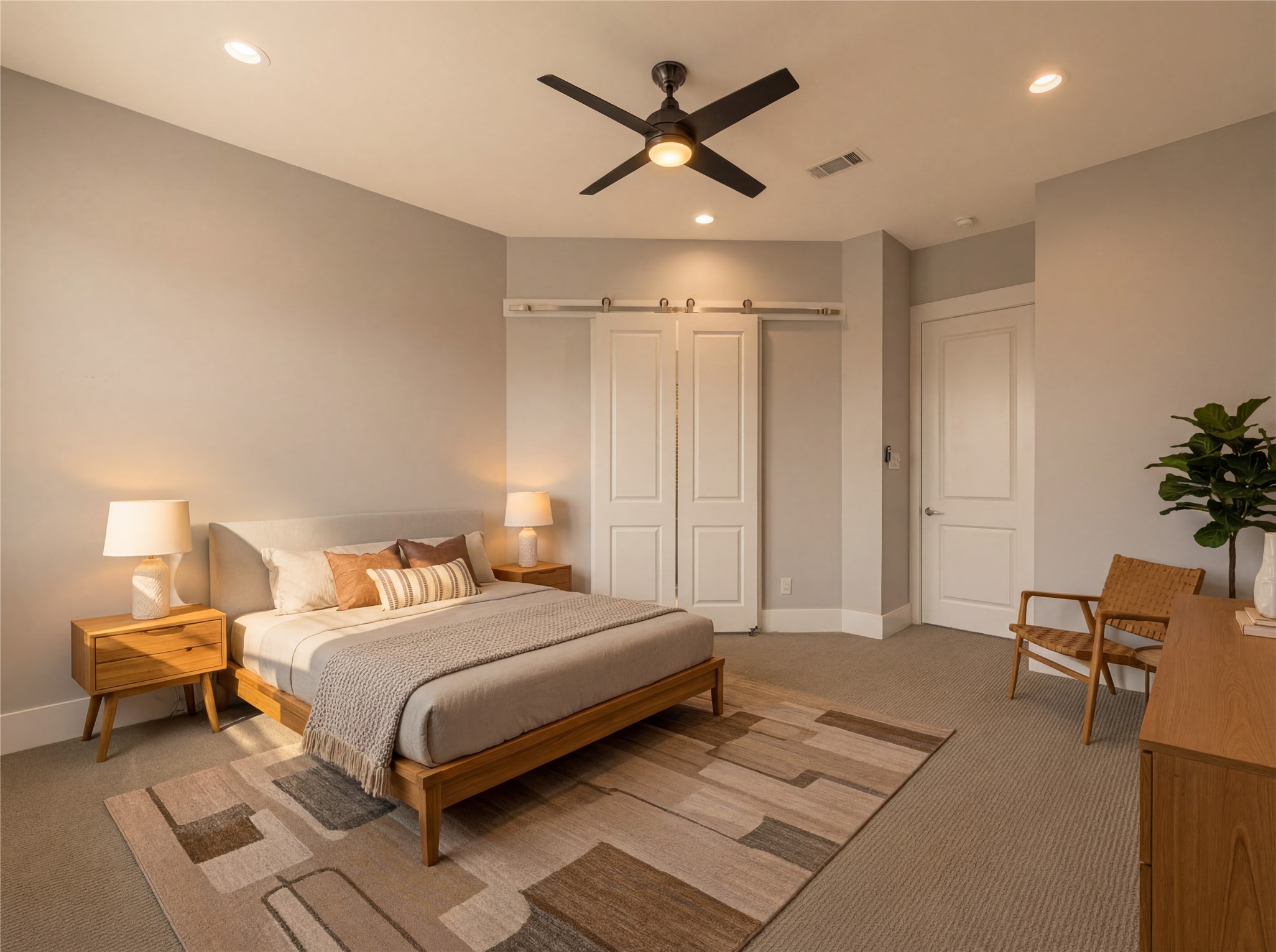 4506 Hardy Street, Unit A Houston, TX 77009 - Photo 18 of 35 a bedroom with a bed chandelier and a window