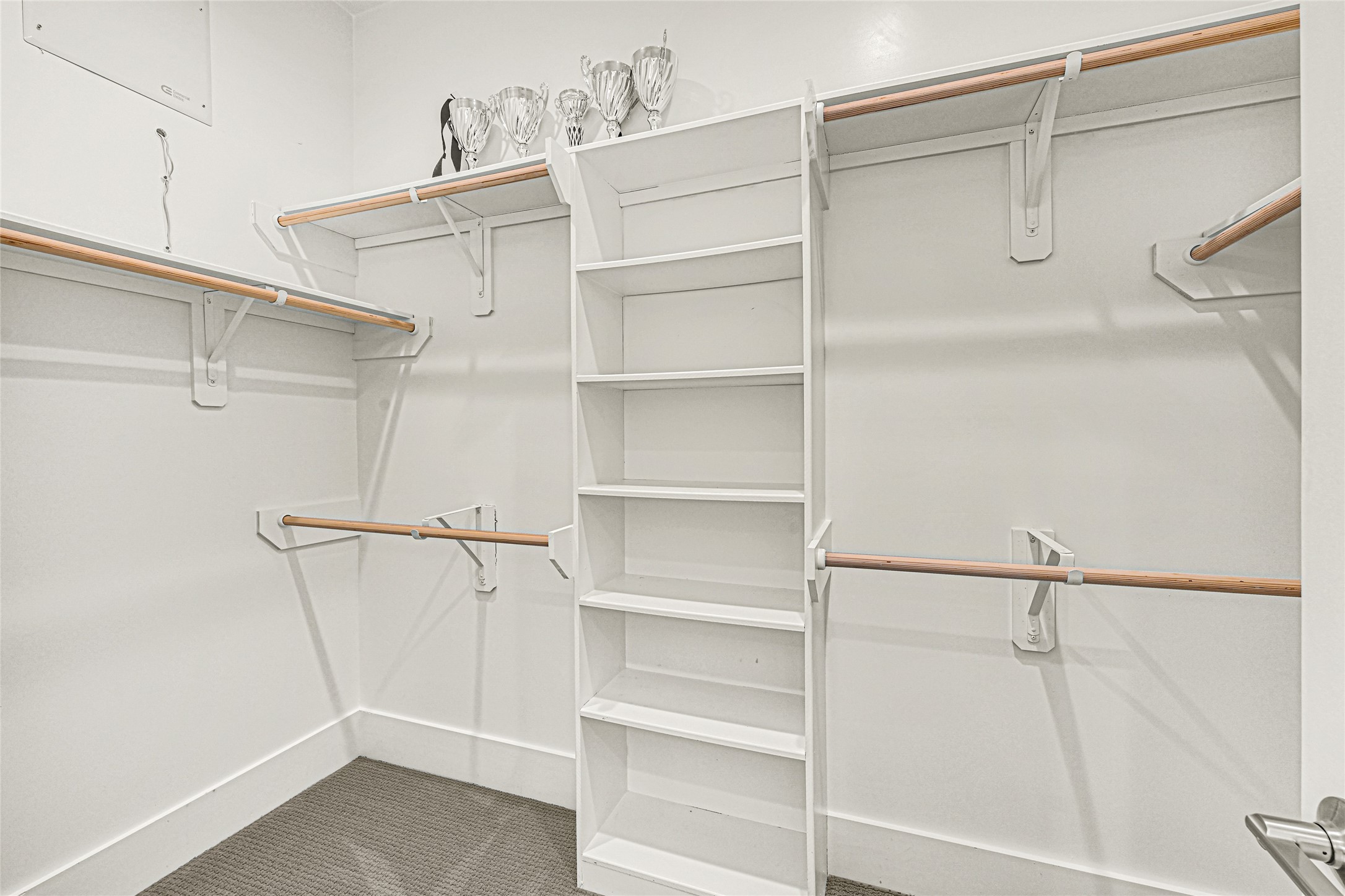 4506 Hardy Street, Unit A Houston, TX 77009 - Photo 24 of 35 a view of walk in closet with empty racks