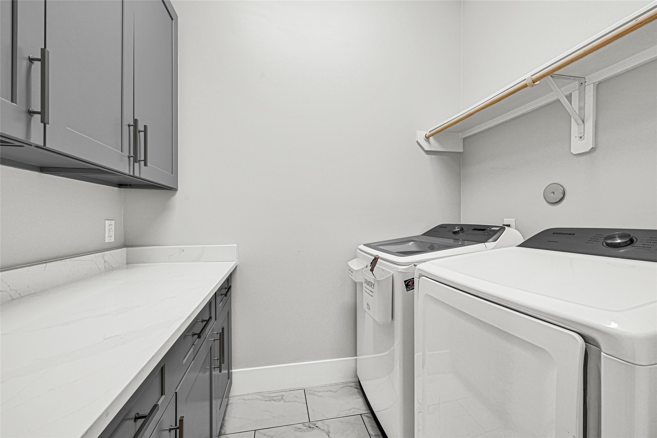 4506 Hardy Street, Unit A Houston, TX 77009 - Photo 25 of 35 a utility room with dryer and washer