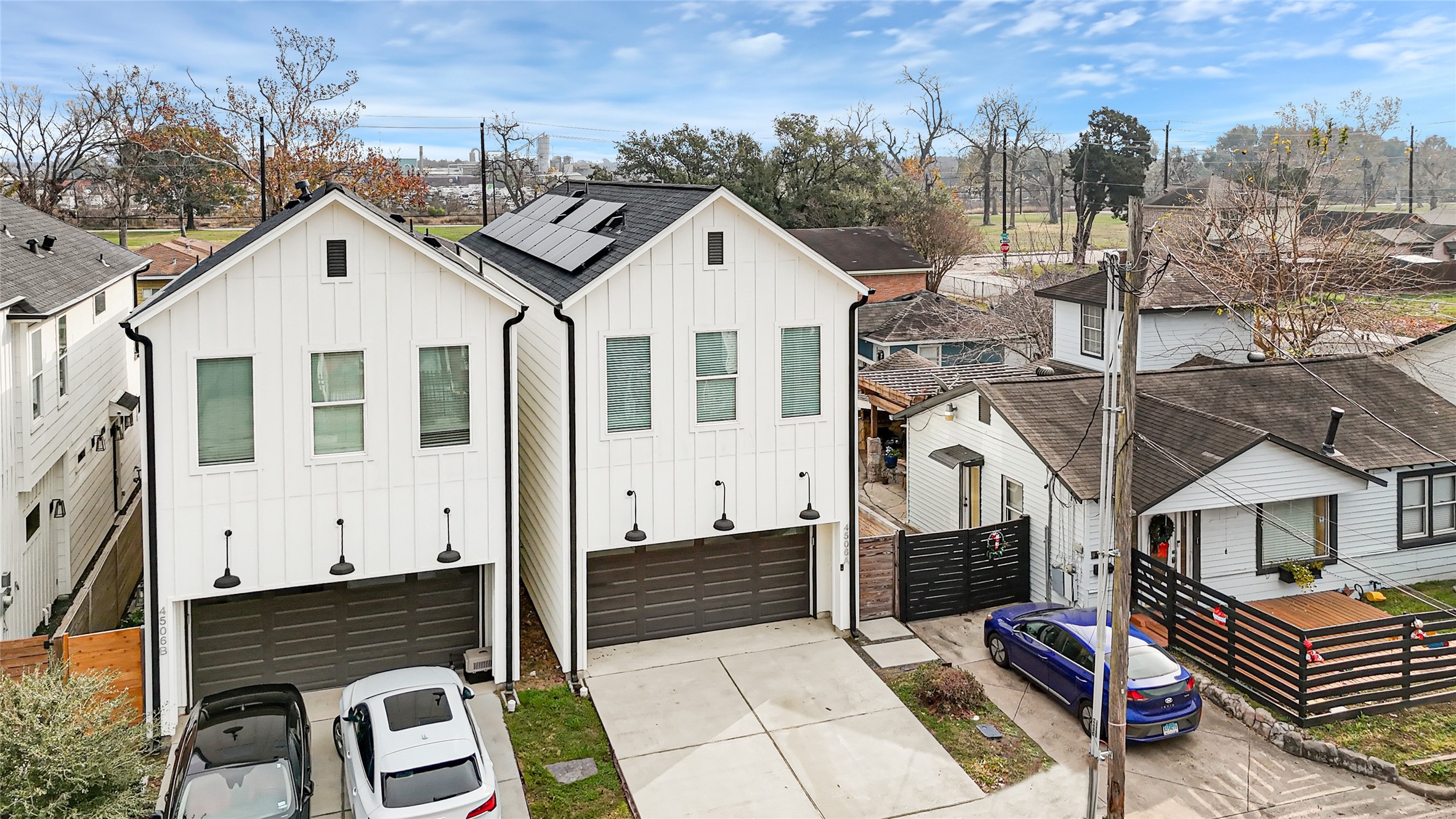 4506 Hardy Street, Unit A Houston, TX 77009 - Photo 30 of 35 a view of a white house with a yard and potted plants