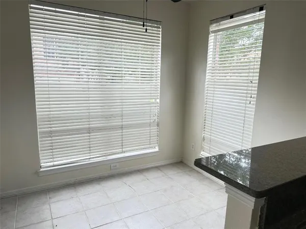 a view of a room that has a window in it