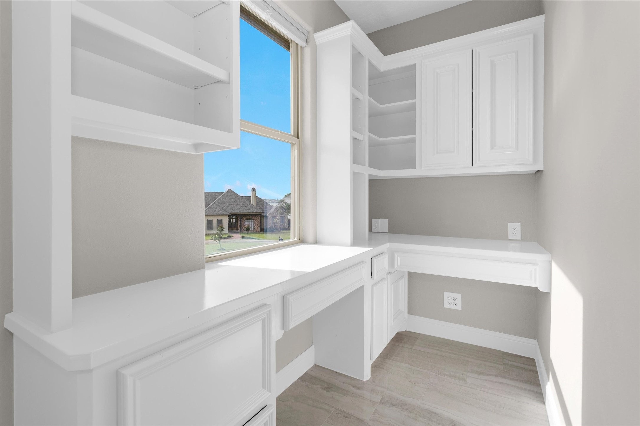 10887 Decatur Street Willis, TX 77318 - Photo 35 of 50 Dedicated study/home office area just off the bedroom, complete with built-in cabinetry and workspace—ideal for working from home or a quiet retreat.