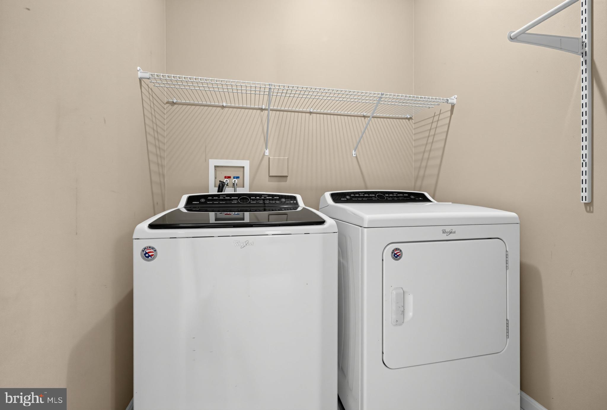 3938 Addison Woods Road Frederick, MD 21704 - Photo 32 of 39 Laundry convenience in a cozy nook.