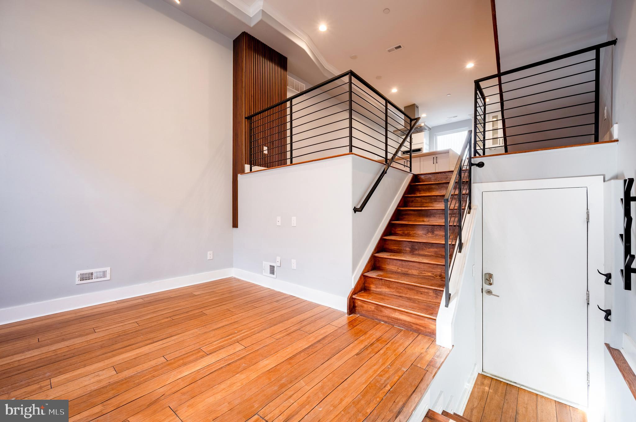 605 McClellan Street Philadelphia, PA 19148 - Photo 15 of 26 a view of entryway and hall with wooden floor